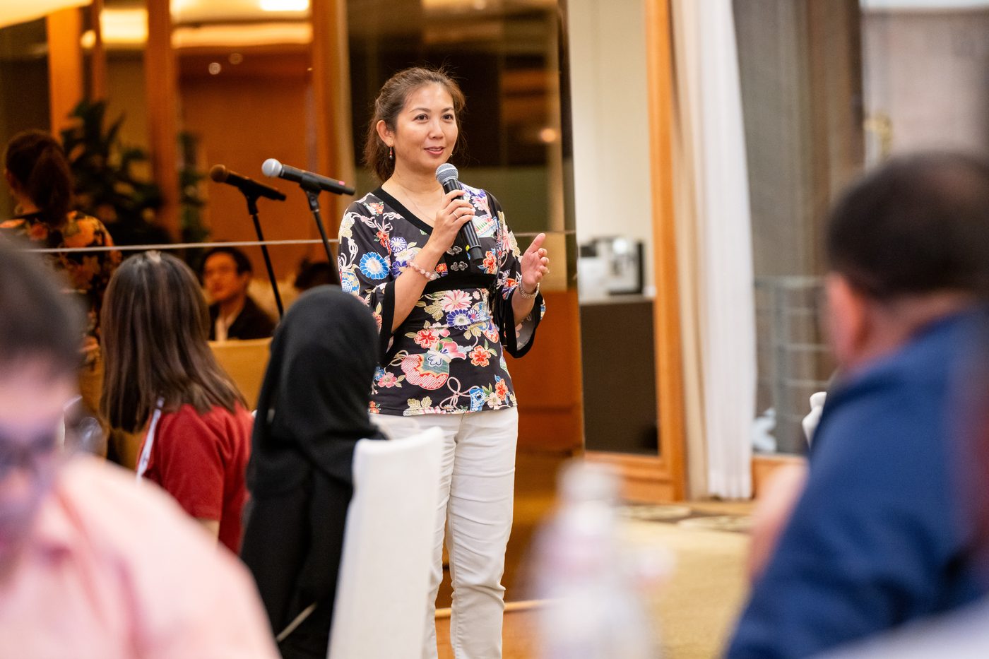 Moonlake Lee speaking at the 2024 NYC Brunei Singapore Conference