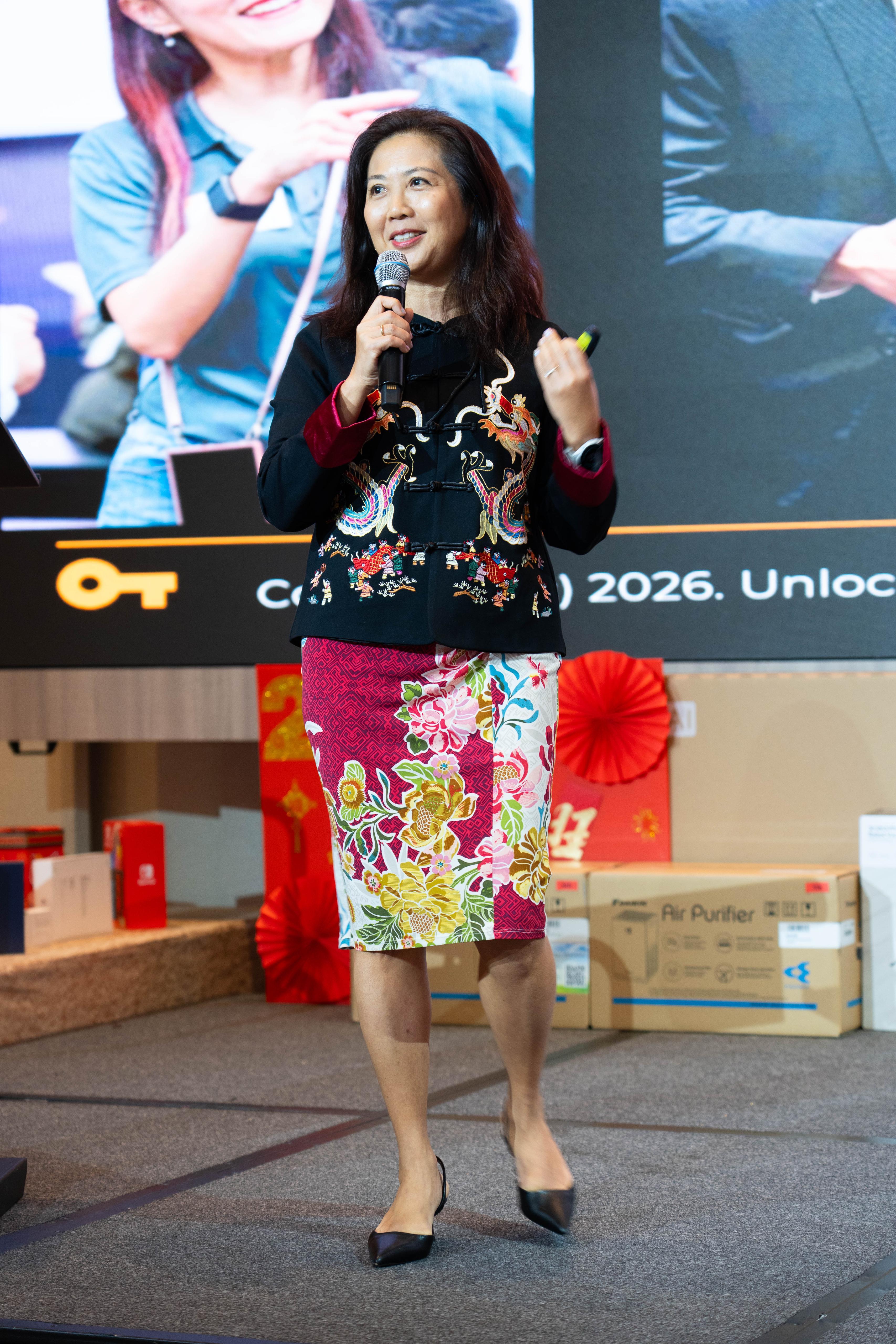 Moonlake Lee on stage at an event